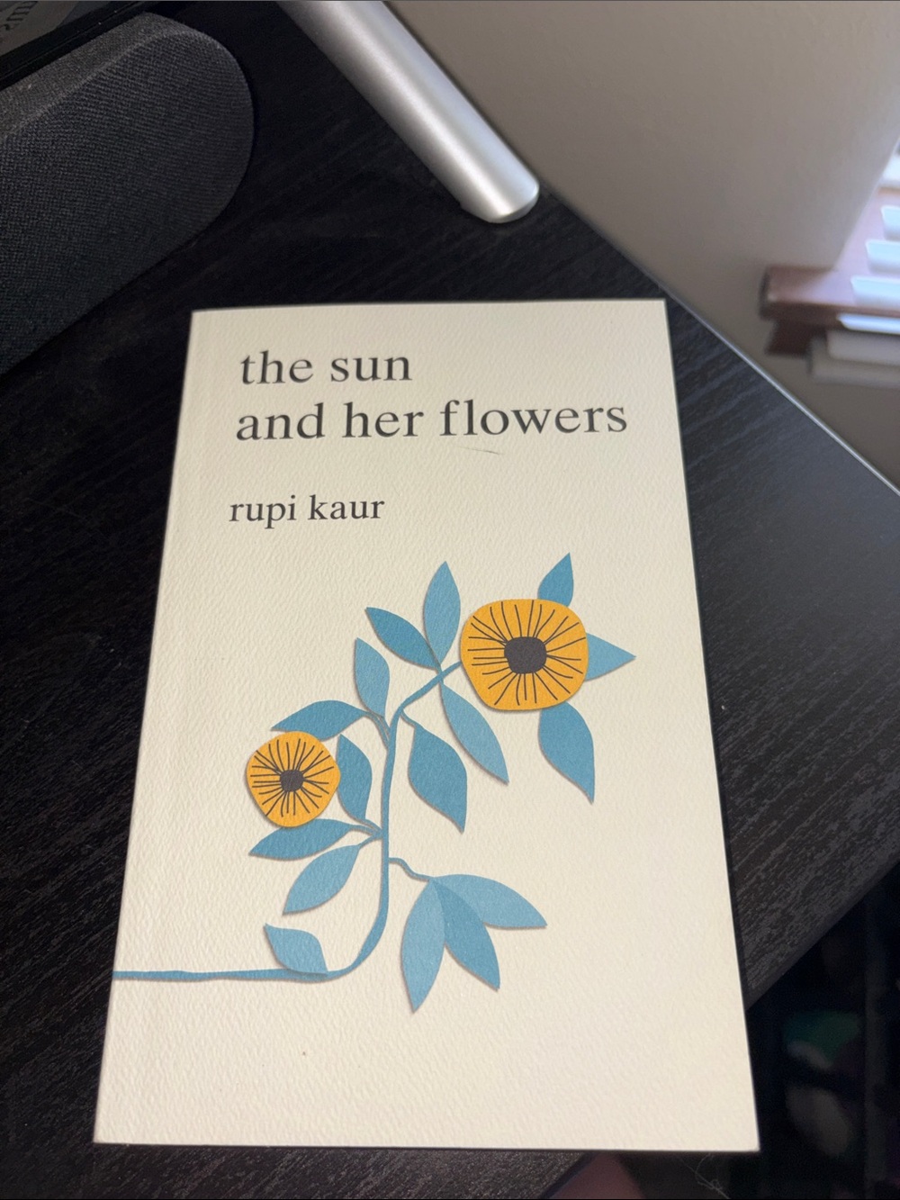 The Sun and Her Flowers — Cream Cover with Blue & Yellow Floral Art